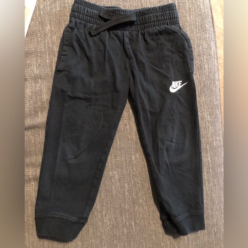 Nike Kids Black Jogger Pants with White Swoosh